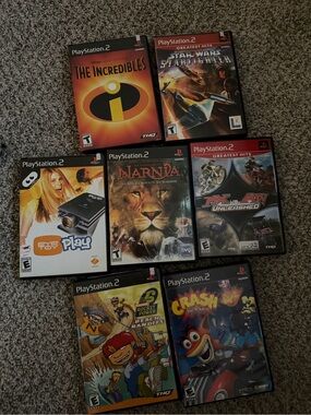 Sony PlayStation 2 Game Bundle - Black Cases with Colorful Covers